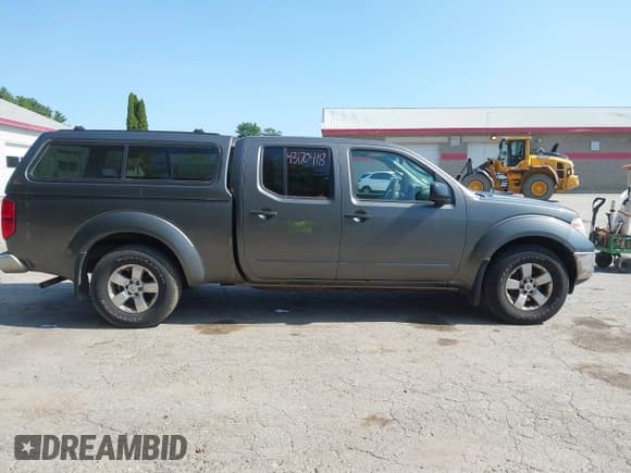 ✅ 2009 Nissan Frontier SE • VIN: 1N6AD09WX9C401340 • Лот: 43170418. Опубликован ранее на IAAI с пробегом 212 858 миль. Бесплатный доступ к архиву аукционных продаж из США и подробный отчёт об истории автомобиля на DreamBid. Изображение 13.