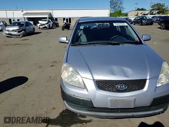 ✅ 2009 Kia Rio LX • VIN: KNADE243896542523 • Lot: 70467655. Listed on Copart with 121,444 mi. Free auction sales archive from the USA and detailed vehicle history report at DreamBid. Image 13.
