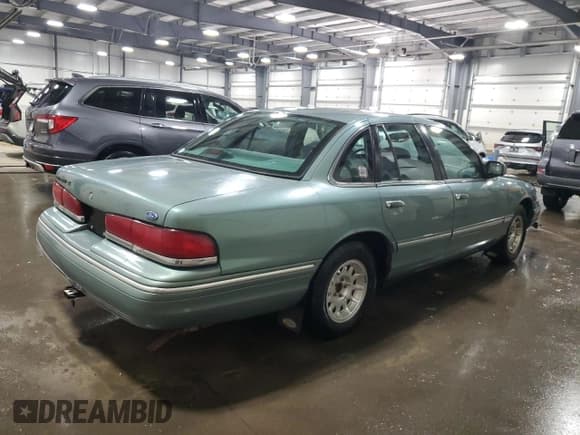 ✅ 1997 Ford Crown Victoria LX • VIN: 2FALP74W8VX231100 • Lot: 46806545. Listed on Copart with 156,739 mi. Free auction sales archive from the USA and detailed vehicle history report at DreamBid. Image 3.