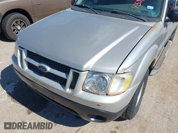 ✅ 2004 Ford Explorer Sport Trac XLS • VIN: 1FMZU77K34UA65740 • Lot: 43589534. Listed on IAAI with 310,281 mi. Free auction sales archive from the USA and detailed vehicle history report at DreamBid. Image 6.