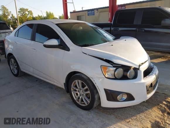 2014 Chevrolet Sonic LT with VIN 1G1JC5SG9E4127762, listed as a IAAI auction lot 43521388 with 128,333 mi miles and . Bid and sale history available at DreamBid. Image 1.