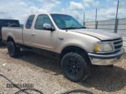 ✅ 1998 Ford F-150 • VIN: 1FTZX1727WNC37192 • Lot: 42801622. Listed on IAAI with 255,085 mi. Free auction sales archive from the USA and detailed vehicle history report at DreamBid. Image 1.