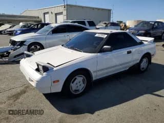 ✅ 1986 Toyota MR2 • VIN: JT2AW15CXG0080034 • Lot: 73423944. Wystawiony na Copart z przebiegiem 54 316 mil. Bezpłatny archiwum sprzedaży aukcyjnych z USA i szczegółowy raport historii pojazdu na DreamBid. Zdjęcie 1.