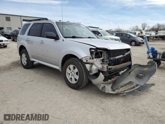 2011 Mercury Mariner z VIN 4M2CN8B73BKJ06886, wystawiony jako Copart lot #50308485 z przebiegiem 118 584 mil mil oraz Szkoda całkowita • Salvage title. Historia ofert i sprzedaży dostępna na DreamBid. Obrazek 4.