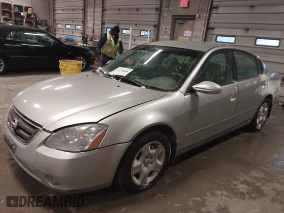 ✅ 2002 Nissan Altima S • VIN: 1N4AL11D32C268583 • Lot: 43796806. Listed on IAAI with 115,118 mi. Free auction sales archive from the USA and detailed vehicle history report at DreamBid. Image 2.