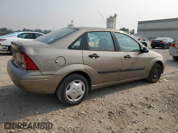 ✅ 2004 Ford Focus LX • VIN: 1FAFP33P94W121604 • Лот: 67125185. Опубликован ранее на Copart с пробегом 104 327 миль. Бесплатный доступ к архиву аукционных продаж из США и подробный отчёт об истории автомобиля на DreamBid. Изображение 3.