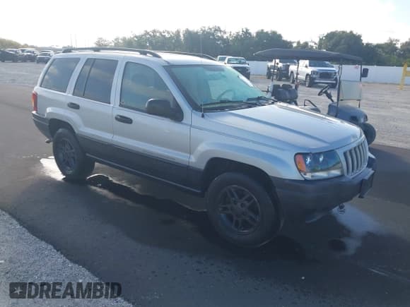 ✅ 2004 Jeep Grand Cherokee Laredo • VIN: 1J4GX48SX4C360639 • Lot: 43402545. Listed on IAAI with 217,717 mi. Free auction sales archive from the USA and detailed vehicle history report at DreamBid. Image 1.