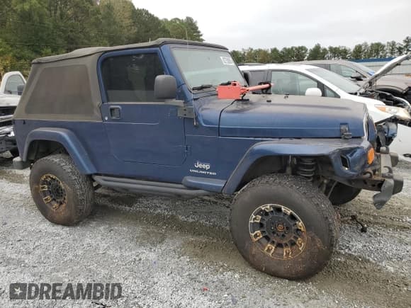✅ 2005 Jeep Wrangler Unlimited • VIN: 1J4FA44S65P315727 • Лот: 82758885. Опубликован ранее на Copart с пробегом 122 766 миль. Бесплатный доступ к архиву аукционных продаж из США и подробный отчёт об истории автомобиля на DreamBid. Изображение 4.