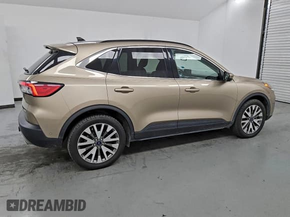 ✅ 2020 Ford Escape Titanium • VIN: 1FMCU9J96LUC77814 • Lot: 91740505. Listed on Copart with 112,914 mi. Free auction sales archive from the USA and detailed vehicle history report at DreamBid. Image 3.