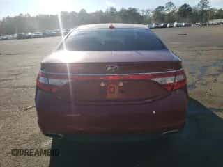 2015 Hyundai Azera z VIN KMHFG4JG8FA467268, wystawiony jako Copart lot #47609165 z przebiegiem 143 859 mil mil oraz Szkoda całkowita • Salvage title. Historia ofert i sprzedaży dostępna na DreamBid. Obrazek 6.