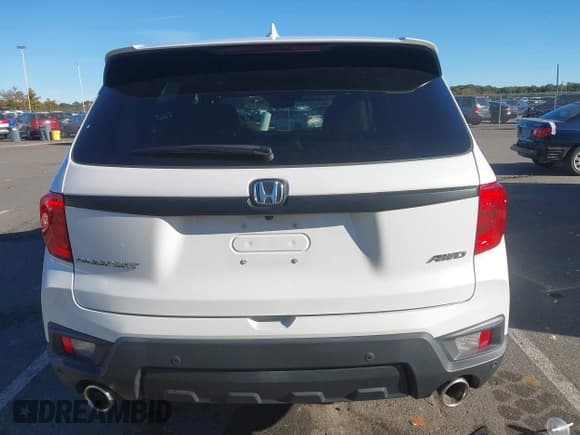 ✅ 2023 Honda Passport EX-L • VIN: 5FNYF8H53PB014146 • Lot: 43469474. Listed on IAAI with 32,713 mi. Free auction sales archive from the USA and detailed vehicle history report at DreamBid. Image 16.