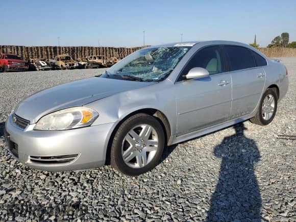 2012 Chevrolet Impala LT Fleet with VIN 2G1WG5E3XC1184564, listed as a Copart auction lot 86266135 with 160,096 mi miles and Salvage title. Bid and sale history available at DreamBid. Image 1.