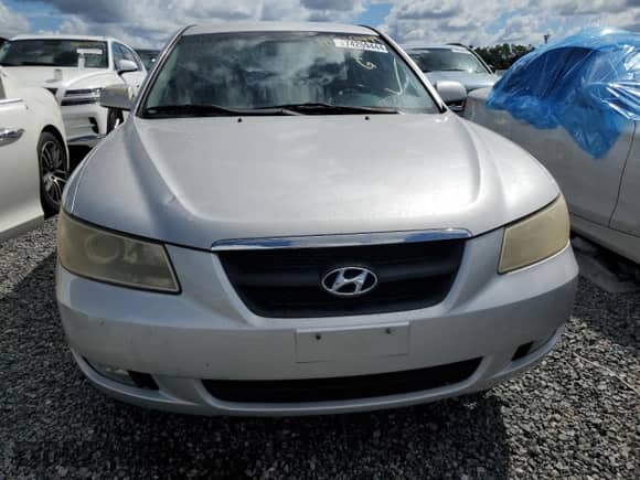 2006 Hyundai Sonata GLS с VIN KMHEU46C76A147417, выставлен на аукционе Copart как лот 74259444 с пробегом Не указан миль и Списание • Salvage title. История ставок и продаж доступна на DreamBid. Изображение 5.