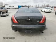 ✅ 2013 Jaguar XJ • VIN: SAJWJ1CD5D8V53294 • Lot: 49711445. Wystawiony na Copart z przebiegiem 100 675 mil. Bezpłatny archiwum sprzedaży aukcyjnych z USA i szczegółowy raport historii pojazdu na DreamBid. Zdjęcie 6.