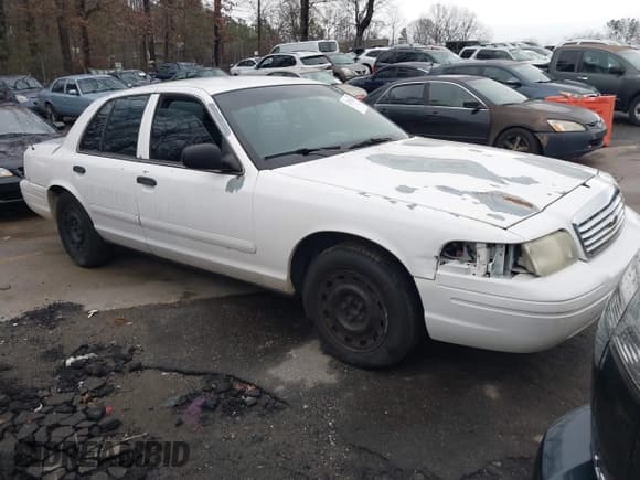 ✅ 2005 Ford Police Interceptor • VIN: 2FAFP71W75X120703 • Lot: 41256222. Listed on IAAI with 208,095 mi. Free auction sales archive from the USA and detailed vehicle history report at DreamBid. Image 1.