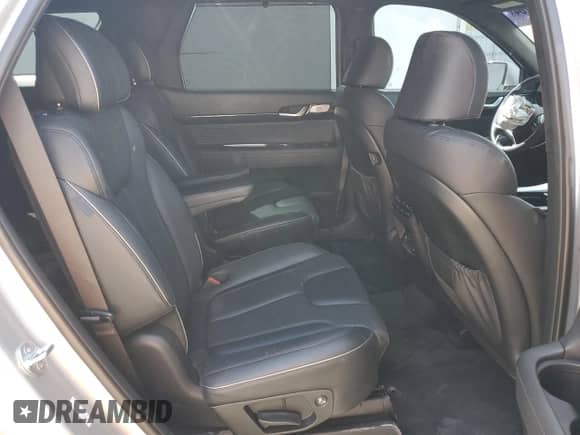 2023 Hyundai Palisade Calligraphy с VIN KM8R74GE4PU597177, выставлен на аукционе Copart как лот 77450264 с пробегом 21 616 миль миль и Списание • Salvage title. История ставок и продаж доступна на DreamBid. Изображение 11.