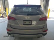 ✅ 2018 Hyundai Santa Fe 2.4L • VIN: 5NMZT3LB7JH085935 • Лот: 84585315. Опубликован ранее на Copart с пробегом 121 027 миль. Бесплатный доступ к архиву аукционных продаж из США и подробный отчёт об истории автомобиля на DreamBid. Изображение 6.
