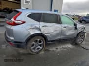 ✅ 2018 Honda CR-V EX • VIN: 7FARW1H58JE041284 • Lot: 94117385. Listed on Copart with 49,173 mi. Free auction sales archive from the USA and detailed vehicle history report at DreamBid. Image 3.