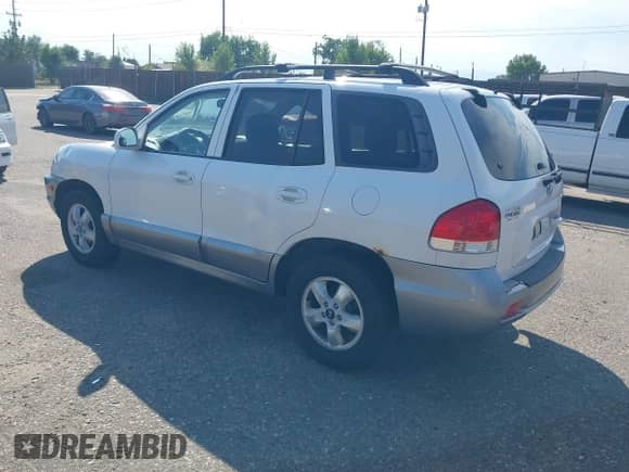 2005 Hyundai Santa Fe GLS z VIN KM8SC73E75U968818, wystawiony jako IAAI lot #43040301 z przebiegiem 200 279 mil mil oraz . Historia ofert i sprzedaży dostępna na DreamBid. Obrazek 3.