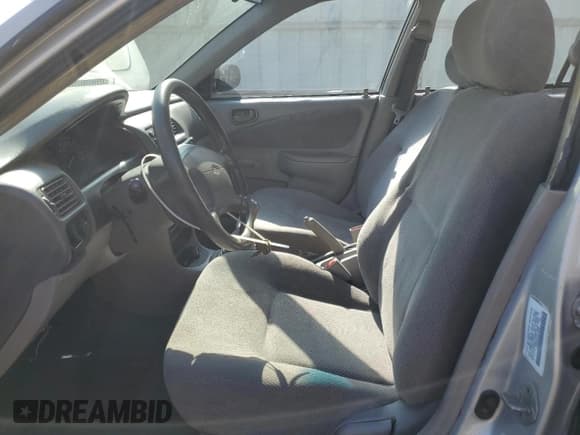 ✅ 2002 Chevrolet Prizm • VIN: 1Y1SK52842Z408689 • Lot: 80474435. Listed on Copart with 297,701 mi. Free auction sales archive from the USA and detailed vehicle history report at DreamBid. Image 7.