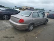 ✅ 2003 Kia Spectra • VIN: KNAFB121735291116 • Lot: 66861134. Listed on Copart with 167,222 mi. Free auction sales archive from the USA and detailed vehicle history report at DreamBid. Image 3.