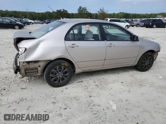 ✅ 2003 Toyota Corolla LE • VIN: 1NXBR32E33Z148578 • Lot: 82385425. Listed on Copart with 197,591 mi. Free auction sales archive from the USA and detailed vehicle history report at DreamBid. Image 3.