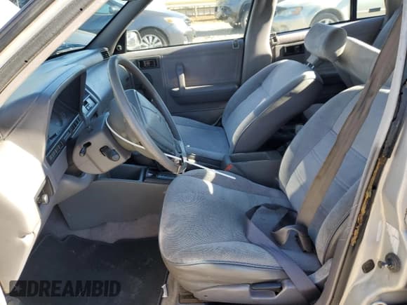 ✅ 1994 Dodge Shadow • VIN: 1B3AP28D5RN193704 • Lot: 82825004. Listed on Copart with 90,223 mi. Free auction sales archive from the USA and detailed vehicle history report at DreamBid. Image 7.