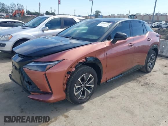 ✅ 2024 Lexus RZ 450e Premium • VIN: JTJAAAAB0RA024522 • Лот: 41640154. Опубликован ранее на IAAI с пробегом 8 851 миль. Бесплатный доступ к архиву аукционных продаж из США и подробный отчёт об истории автомобиля на DreamBid. Изображение 2.