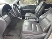 ✅ 2006 Honda Odyssey EX-L • VIN: 5FNRL38656B410666 • Лот: 80554015. Опубликован ранее на Copart с пробегом 243 001 миль. Бесплатный доступ к архиву аукционных продаж из США и подробный отчёт об истории автомобиля на DreamBid. Изображение 7.