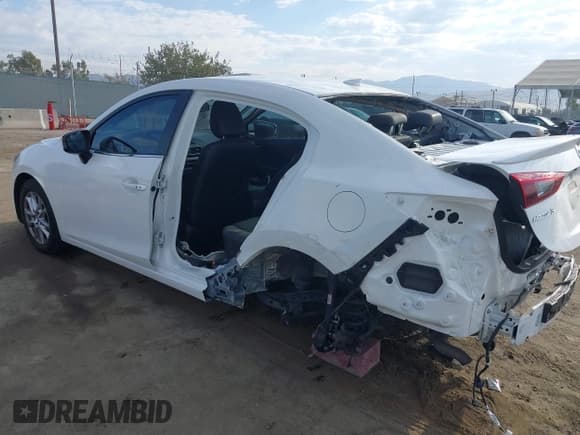 ✅ 2016 Mazda 3 i Grand Touring • VIN: JM1BM1X73G1346876 • Lot: 40283164. Listed on IAAI with 102,264 mi. Free auction sales archive from the USA and detailed vehicle history report at DreamBid. Image 3.