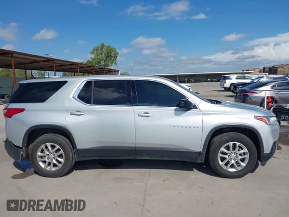 ✅ 2020 Chevrolet Traverse LS • VIN: 1GNERFKW1LJ250465 • Lot: 43244251. Listed on IAAI with 124,464 mi. Free auction sales archive from the USA and detailed vehicle history report at DreamBid. Image 14.