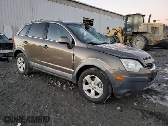 2014 Chevrolet Captiva Sport LS с VIN 3GNAL2EK7ES582557, выставлен на аукционе Copart как лот 81590774 с пробегом 94 174 миль миль и Списание • Salvage title. История ставок и продаж доступна на DreamBid. Изображение 4.