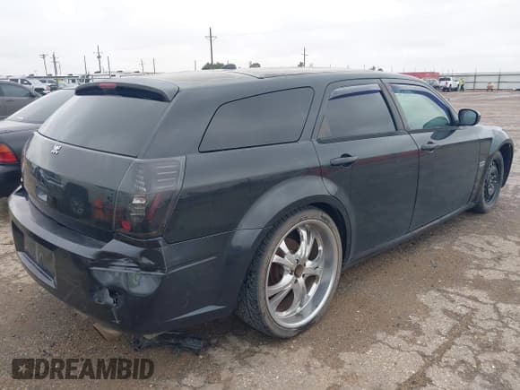 ✅ 2005 Dodge Magnum RT • VIN: 2D8GV582X5H544304 • Lot: 42138995. Listed on IAAI with 204,484 mi. Free auction sales archive from the USA and detailed vehicle history report at DreamBid. Image 4.