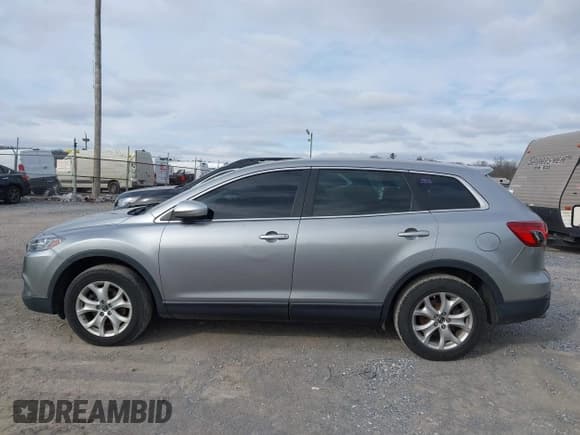 ✅ 2015 Mazda CX-9 Touring • VIN: JM3TB2CVXF0455691 • Lot: 43916875. Listed on IAAI with 207,507 mi. Free auction sales archive from the USA and detailed vehicle history report at DreamBid. Image 14.