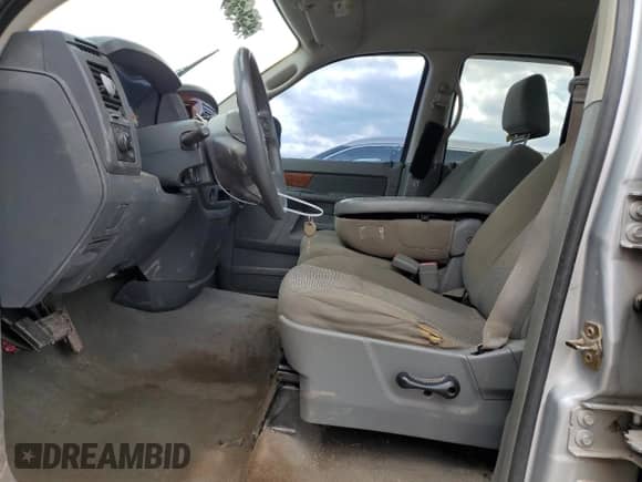 2006 Dodge 1500 SLT с VIN 1D7HU18N56S678677, выставлен на аукционе Copart как лот 48652354 с пробегом 174 650 миль миль и Списание • Salvage title. История ставок и продаж доступна на DreamBid. Изображение 7.