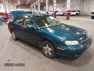 2003 Chevrolet Malibu LS z VIN 1G1NE52J63M611716, wystawiony jako IAAI lot #42454465 z przebiegiem 132 320 mil mil oraz . Historia ofert i sprzedaży dostępna na DreamBid. Obrazek 1.