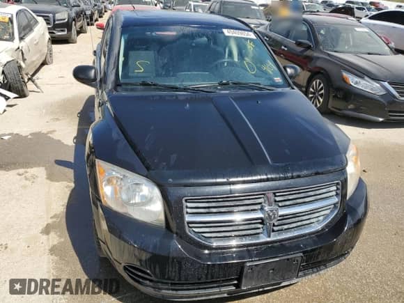 2009 Dodge Caliber SXT с VIN 1B3HB48AX9D209500, выставлен на аукционе Copart как лот 49409854 с пробегом 150 773 миль миль и Списание • Salvage title. История ставок и продаж доступна на DreamBid. Изображение 5.