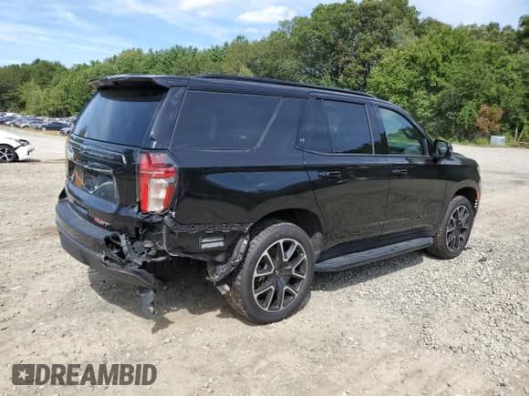 2022 Chevrolet Tahoe RST with VIN 1GNSKRKD0NR244846, listed as a Copart auction lot 70801855 with 69,403 mi miles and Salvage title. Bid and sale history available at DreamBid. Image 3.