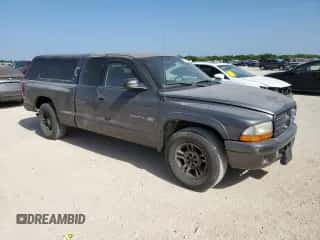 2002 Dodge Dakota с VIN 1B7GL12X32S716758, выставлен на аукционе Copart как лот 61710754 с пробегом 265 494 миль миль и Списание • Salvage title. История ставок и продаж доступна на DreamBid. Изображение 4.