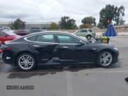 ✅ 2015 Tesla Model S 85 • VIN: 5YJSA1E16FF107254 • Lot: 43741109. Listed on IAAI with 119,933 mi. Free auction sales archive from the USA and detailed vehicle history report at DreamBid. Image 14.