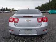 ✅ 2015 Chevrolet Malibu LTZ • VIN: 1G11F5SL3FF282110 • Lot: 43516279. Listed on IAAI with 131,961 mi. Free auction sales archive from the USA and detailed vehicle history report at DreamBid. Image 16.