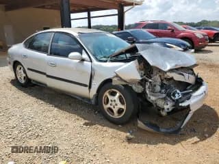 ✅ 1999 Ford Taurus SE • VIN: 1FAFP53S1XA324648 • Lot: 68235134. Listed on Copart with 184,439 mi. Free auction sales archive from the USA and detailed vehicle history report at DreamBid. Image 4.
