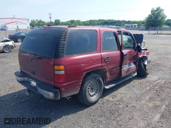 2001 Chevrolet Tahoe LT z VIN 1GNEK13T21J295102, wystawiony jako IAAI lot #42568135 z przebiegiem 286 769 mil mil oraz . Historia ofert i sprzedaży dostępna na DreamBid. Obrazek 4.