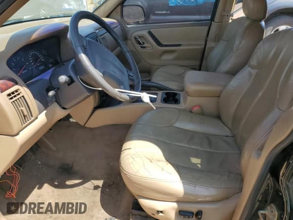 ✅ 2000 Jeep Grand Cherokee Laredo • VIN: 1J4GW48N0YC210235 • Lot: 60558905. Listed on Copart with 131,108 mi. Free auction sales archive from the USA and detailed vehicle history report at DreamBid. Image 7.