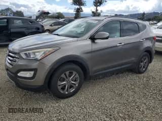 2015 Hyundai Santa Fe с VIN 5XYZU3LB5FG267809, выставлен на аукционе Copart как лот 72087975 с пробегом 103 733 миль миль и Списание • Salvage title. История ставок и продаж доступна на DreamBid. Изображение 1.
