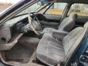 ✅ 1998 Buick LeSabre Custom • VIN: 1G4HP52K4WH546798 • Lot: 81989525. Wystawiony na Copart z przebiegiem 169 914 mil. Bezpłatny archiwum sprzedaży aukcyjnych z USA i szczegółowy raport historii pojazdu na DreamBid. Zdjęcie 7.