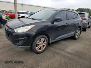 2011 Hyundai Tucson Limited z VIN KM8JU3AC2BU200856, wystawiony jako Copart lot #74826604 z przebiegiem Nie podano mil oraz Szkoda całkowita • Salvage title. Historia ofert i sprzedaży dostępna na DreamBid. Obrazek 1.