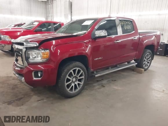 ✅ 2019 GMC Canyon 4WD Denali • VIN: 1GTG6EEN0K1115743 • Лот: 42857710. Опубликован ранее на IAAI с пробегом 57 225 миль. Бесплатный доступ к архиву аукционных продаж из США и подробный отчёт об истории автомобиля на DreamBid. Изображение 18.