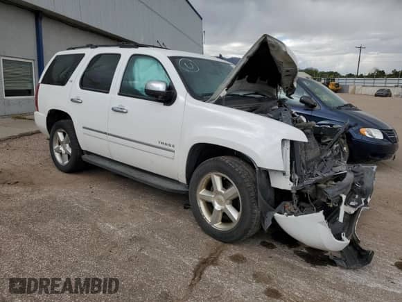 2013 Chevrolet Tahoe LTZ z VIN 1GNSKCE08DR270891, wystawiony jako Copart lot #80282665 z przebiegiem Nie podano mil oraz Nie do naprawy • Non repairable. Historia ofert i sprzedaży dostępna na DreamBid. Obrazek 4.