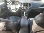 ✅ 2015 Jeep Cherokee Trailhawk • VIN: 1C4PJMBS0FW563072 • Lot: 92593655. Listed on Copart with 64,401 mi. Free auction sales archive from the USA and detailed vehicle history report at DreamBid. Image 8.